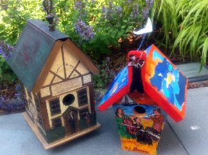 Two birdhouses created for this year's auction by Tricia Marshall and Dorothy Strauss. Image courtesy of Wellfleet Preservation Hall.